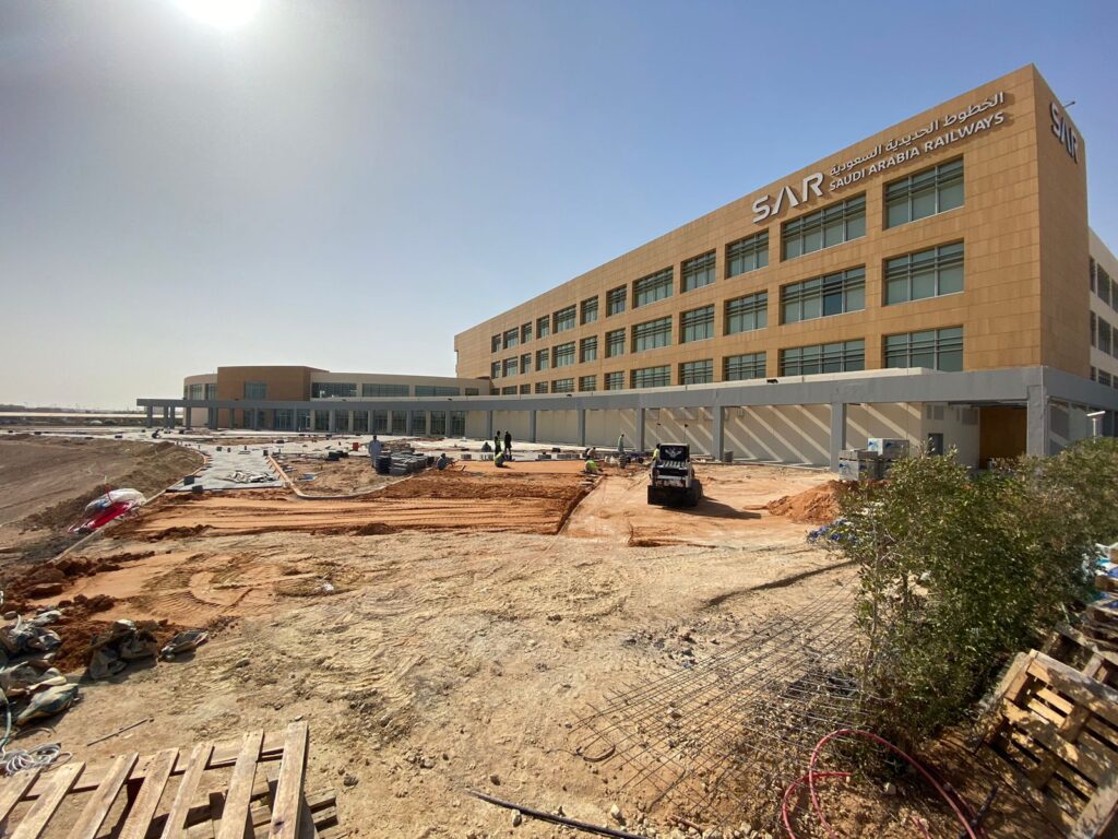 Landscape works project for Saudi Arabia Railways (SAR) featuring outdoor landscaping, walkways, irrigation systems, greenery, and site development works.
